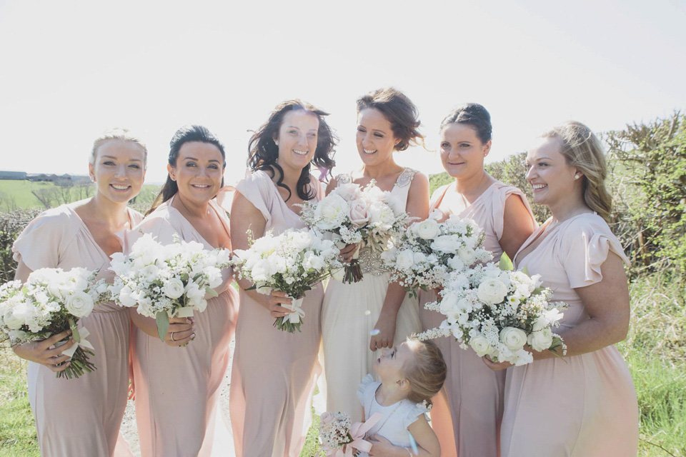 A grecian style gown by Jenny Packham for a rustic inspired Italian Scottish Humanist barn wedding. Images by Mirrorbox Photography.