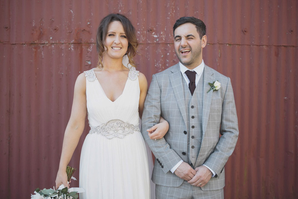 A grecian style gown by Jenny Packham for a rustic inspired Italian Scottish Humanist barn wedding. Images by Mirrorbox Photography.