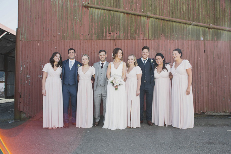 A grecian style gown by Jenny Packham for a rustic inspired Italian Scottish Humanist barn wedding. Images by Mirrorbox Photography.