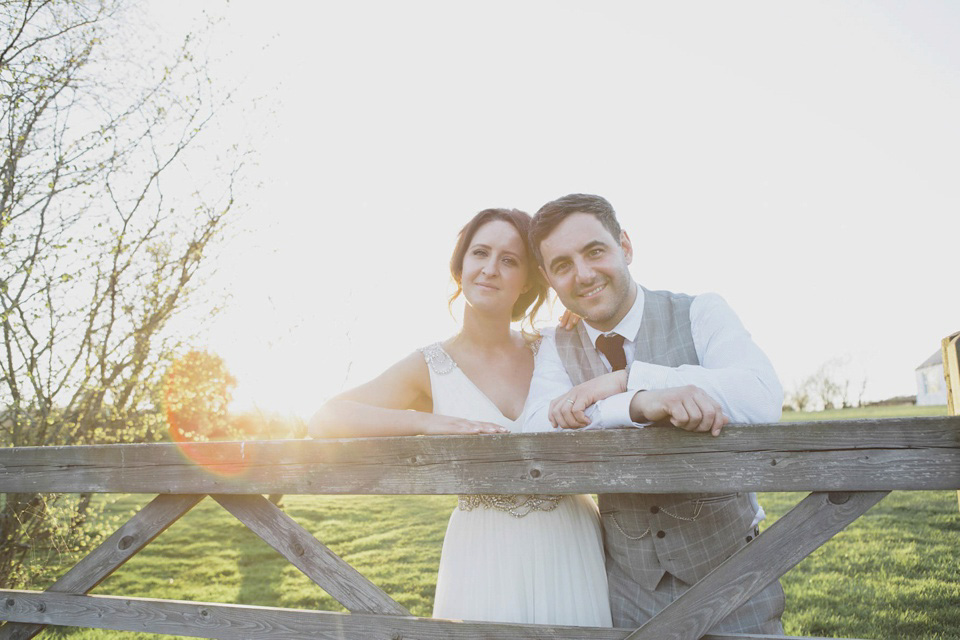 A grecian style gown by Jenny Packham for a rustic inspired Italian Scottish Humanist barn wedding. Images by Mirrorbox Photography.