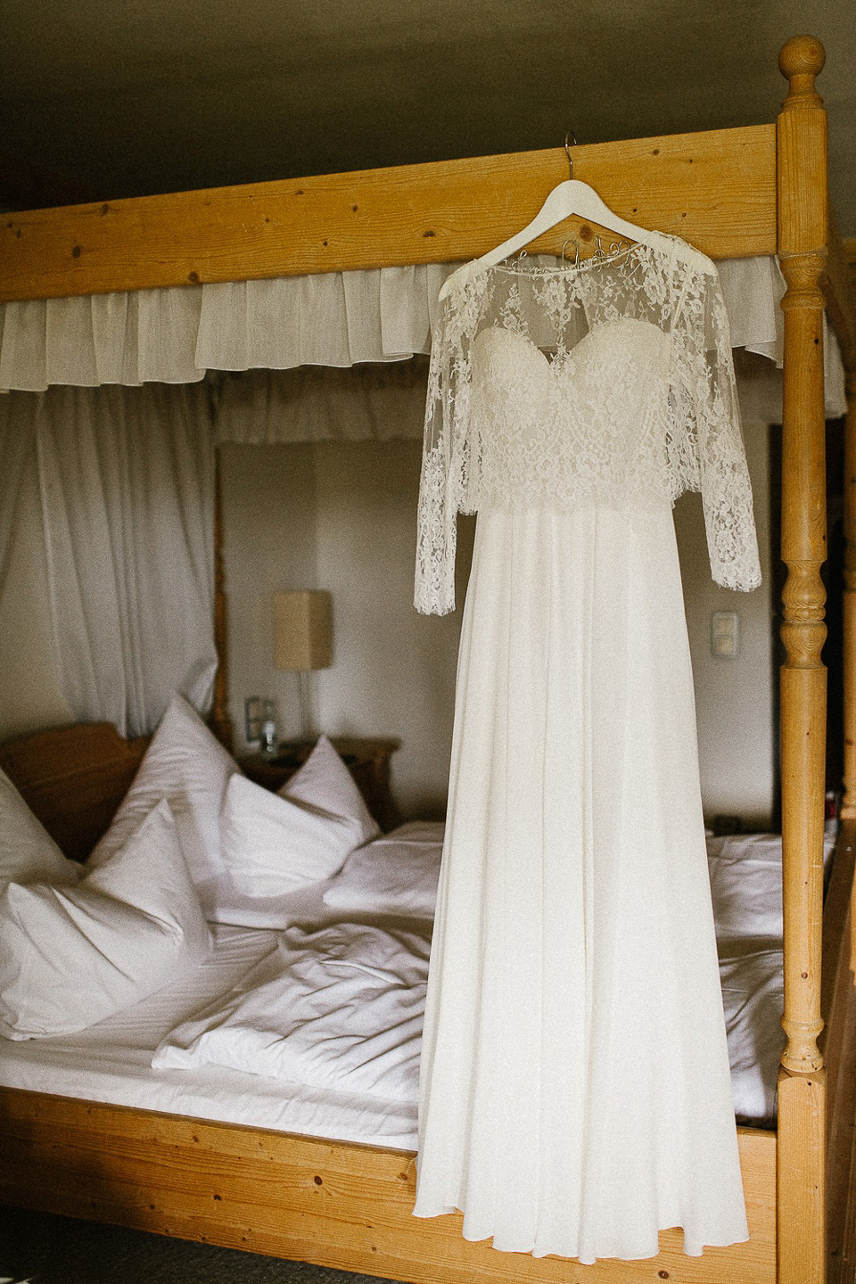 The bride wears Sarah Seven and a Ru de Seine lace blouse for her Boho Rustic Bavarian Farmhouse wedding. Photography by Kevin Klein.