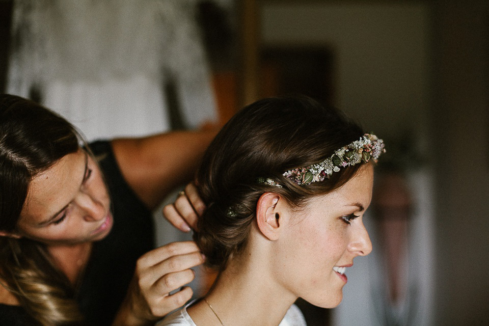 The bride wears Sarah Seven and a Ru de Seine lace blouse for her Boho Rustic Bavarian Farmhouse wedding. Photography by Kevin Klein.