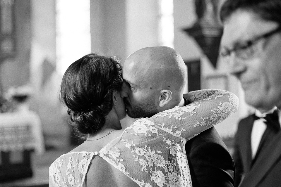 The bride wears Sarah Seven and a Ru de Seine lace blouse for her Boho Rustic Bavarian Farmhouse wedding. Photography by Kevin Klein.