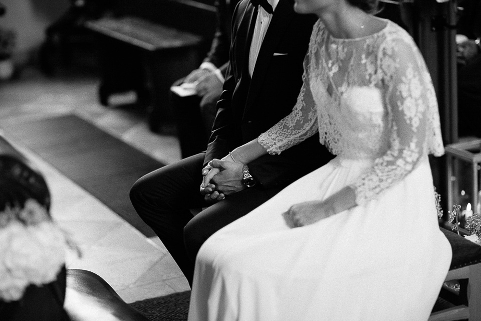 The bride wears Sarah Seven and a Ru de Seine lace blouse for her Boho Rustic Bavarian Farmhouse wedding. Photography by Kevin Klein.