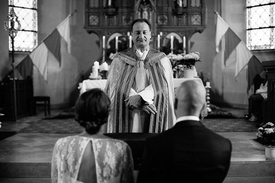 The bride wears Sarah Seven and a Ru de Seine lace blouse for her Boho Rustic Bavarian Farmhouse wedding. Photography by Kevin Klein.