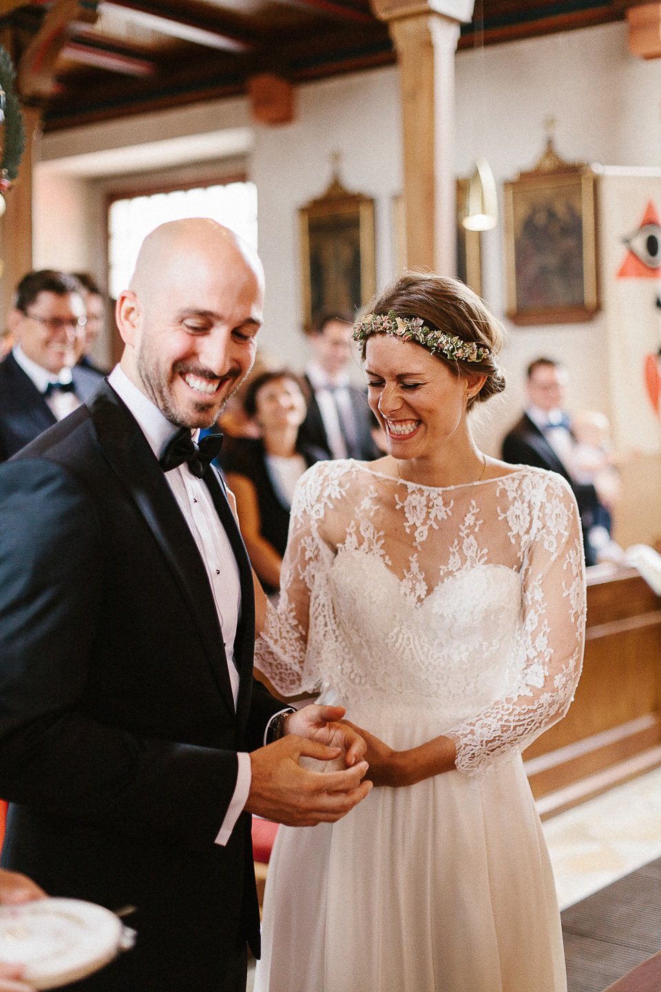 The bride wears Sarah Seven and a Ru de Seine lace blouse for her Boho Rustic Bavarian Farmhouse wedding. Photography by Kevin Klein.