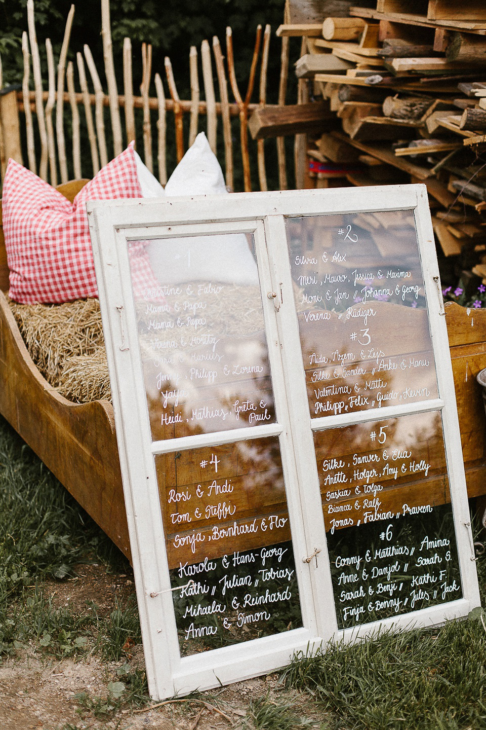 The bride wears Sarah Seven and a Ru de Seine lace blouse for her Boho Rustic Bavarian Farmhouse wedding. Photography by Kevin Klein.