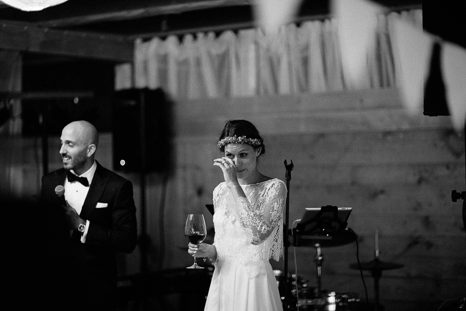 The bride wears Sarah Seven and a Ru de Seine lace blouse for her Boho Rustic Bavarian Farmhouse wedding. Photography by Kevin Klein.