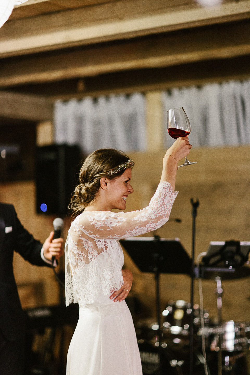 The bride wears Sarah Seven and a Ru de Seine lace blouse for her Boho Rustic Bavarian Farmhouse wedding. Photography by Kevin Klein.