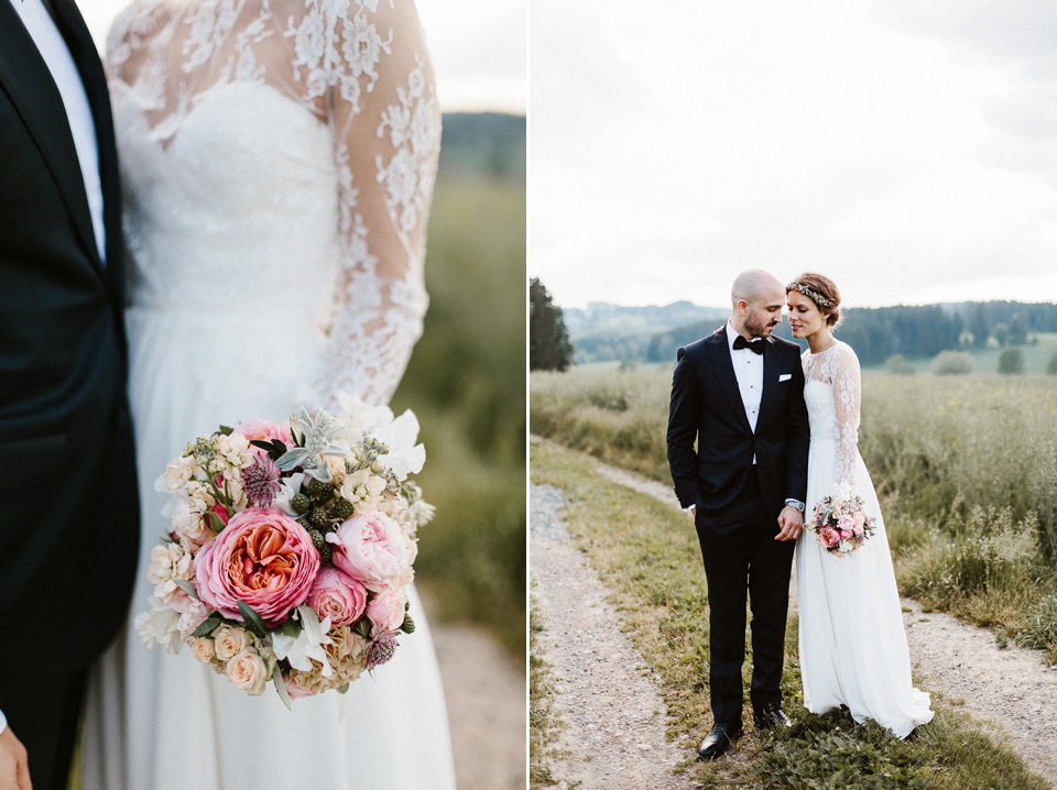 The bride wears Sarah Seven and a Ru de Seine lace blouse for her Boho Rustic Bavarian Farmhouse wedding. Photography by Kevin Klein.