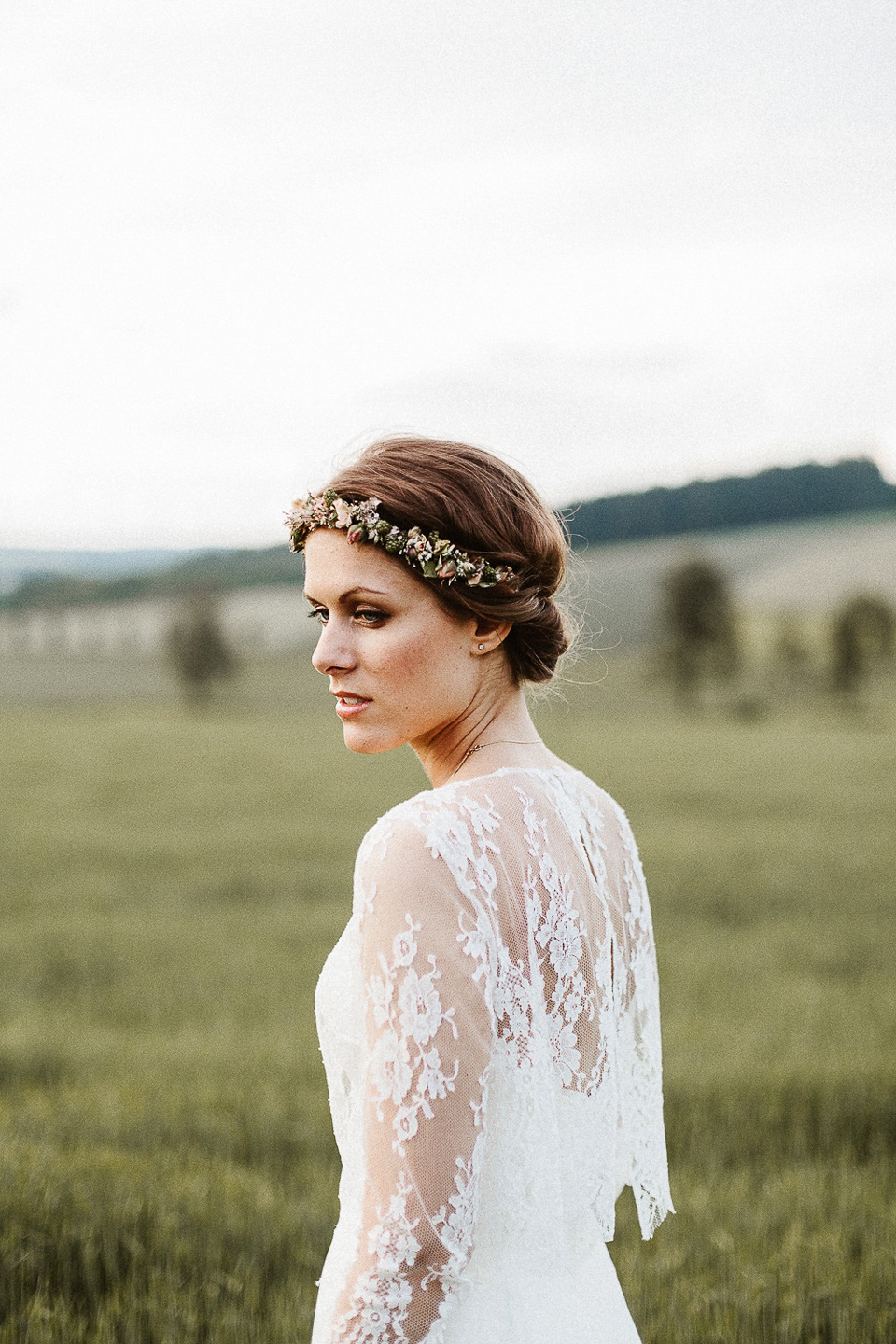 The bride wears Sarah Seven and a Ru de Seine lace blouse for her Boho Rustic Bavarian Farmhouse wedding. Photography by Kevin Klein.