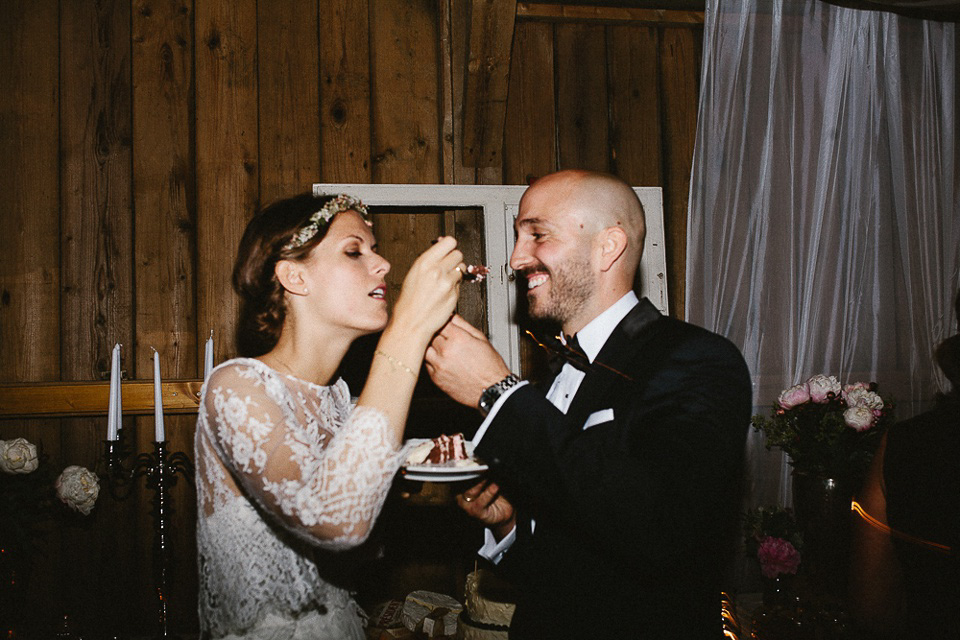 The bride wears Sarah Seven and a Ru de Seine lace blouse for her Boho Rustic Bavarian Farmhouse wedding. Photography by Kevin Klein.