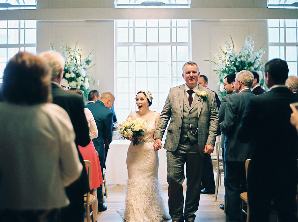 A 1930's Art Deco inspired wedding at The Assembly Rooms in London. Images shot on 35mm film by Peachey Photography.