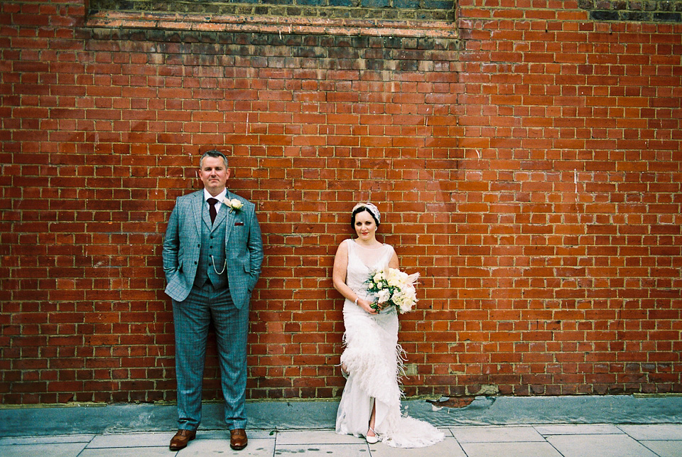 A 1930's Art Deco inspired wedding at The Assembly Rooms in London. Images shot on 35mm film by Peachey Photography.