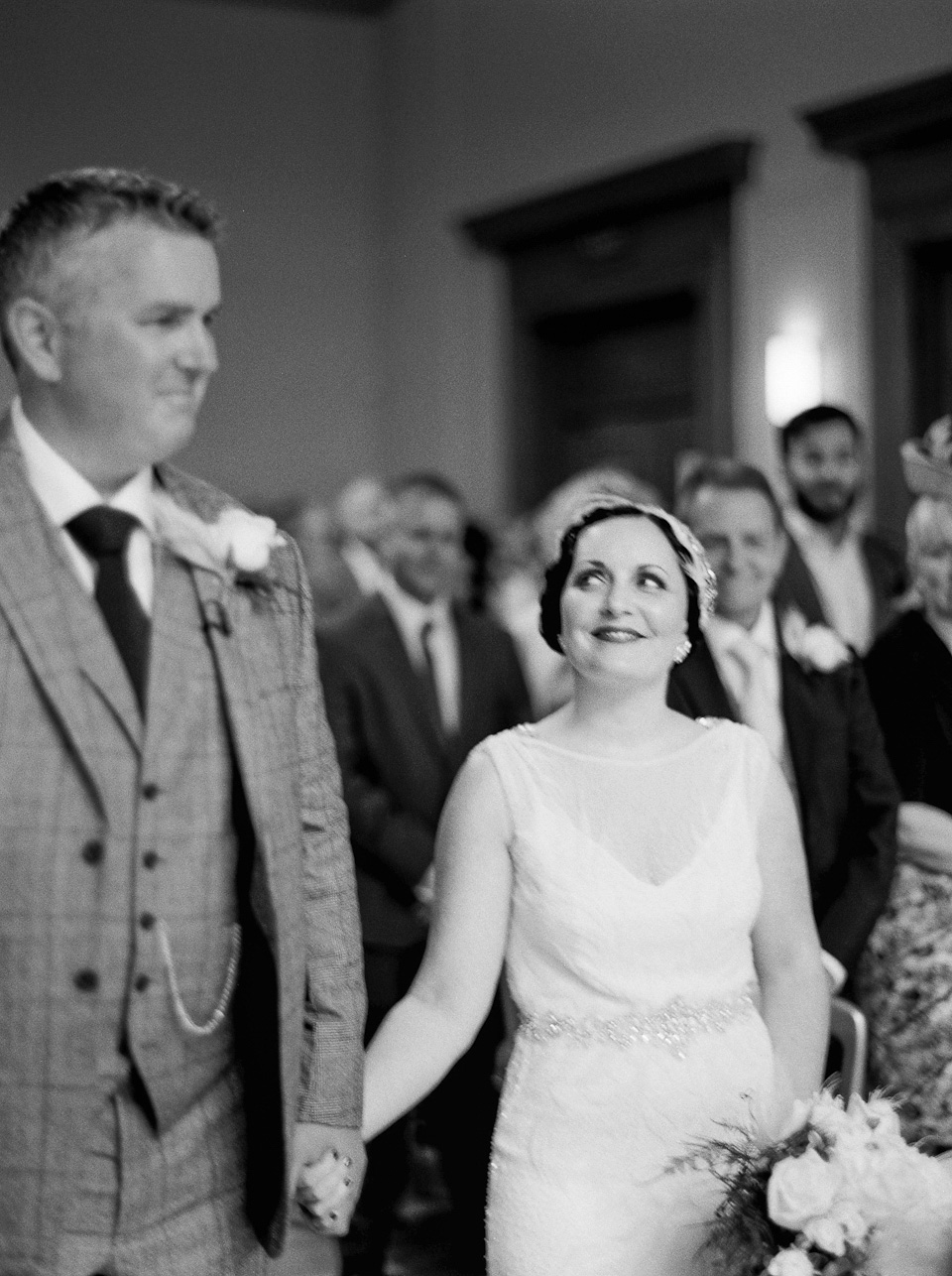 A 1930's Art Deco inspired wedding at The Assembly Rooms in London. Images shot on 35mm film by Peachey Photography.