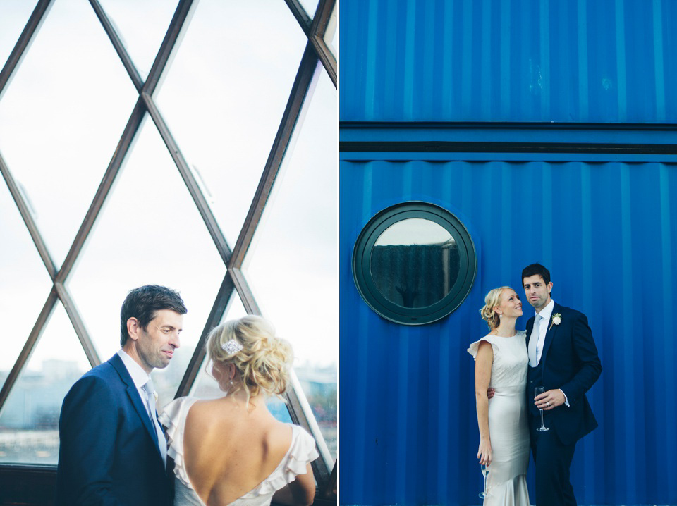 The bride wears a Belle & Bunty gown in blush for her child and family friendly wedding at Trinity Buoy Wharf in London. Photography by Kat Green.