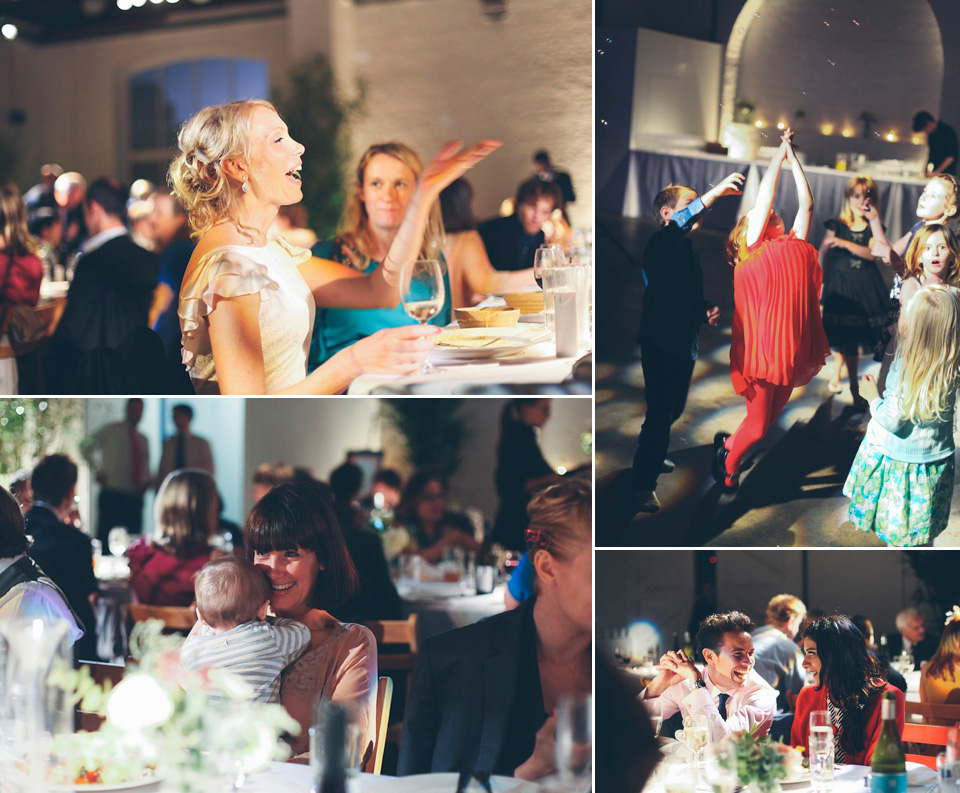 The bride wears a Belle & Bunty gown in blush for her child and family friendly wedding at Trinity Buoy Wharf in London. Photography by Kat Green.