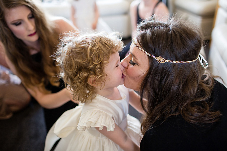 The bride wears Eliza Jane Howell for her Great Gatsby inspired city wedding. Photography by Jo Hastings.