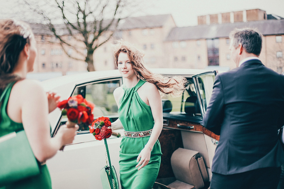 The bride wears green wedding shoes and a 50's style dress from Flossy and Dossy for her Glasgow wedding. Photography by John Elphinstone-Stirling.