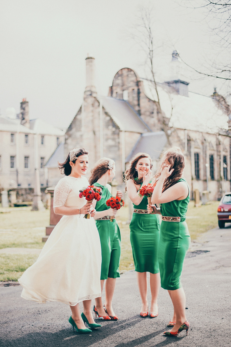 The bride wears green wedding shoes and a 50's style dress from Flossy and Dossy for her Glasgow wedding. Photography by John Elphinstone-Stirling.