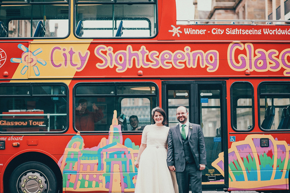 The bride wears green wedding shoes and a 50's style dress from Flossy and Dossy for her Glasgow wedding. Photography by John Elphinstone-Stirling.