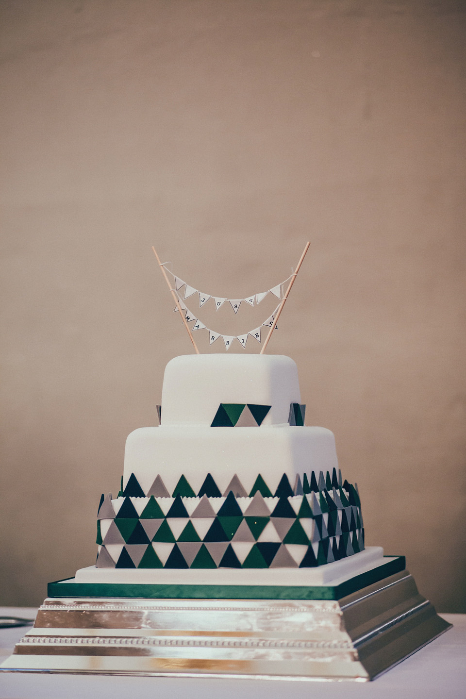 The bride wears green wedding shoes and a 50's style dress from Flossy and Dossy for her Glasgow wedding. Photography by John Elphinstone-Stirling.