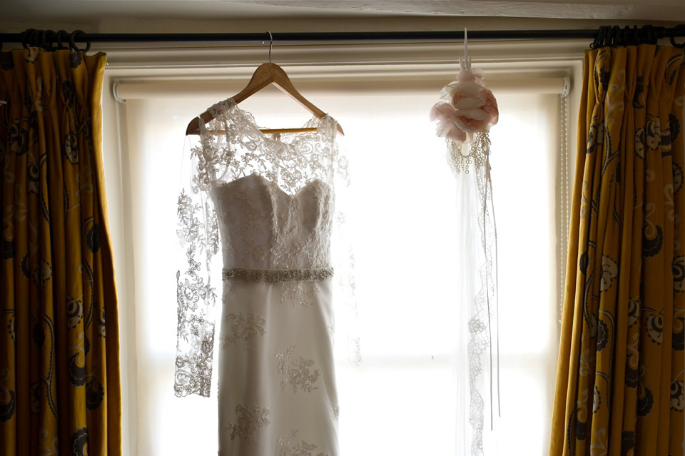 A charming winter wedding at The George in Rye with a bride wearing a Juliet cap veil. Images by The Edge Photography.