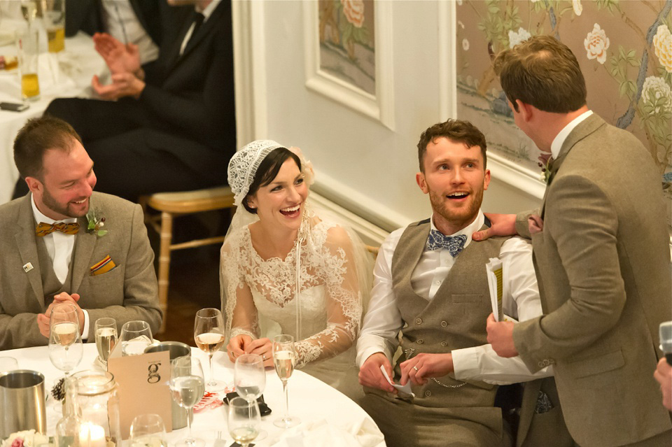 A charming winter wedding at The George in Rye with a bride wearing a Juliet cap veil. Images by The Edge Photography.