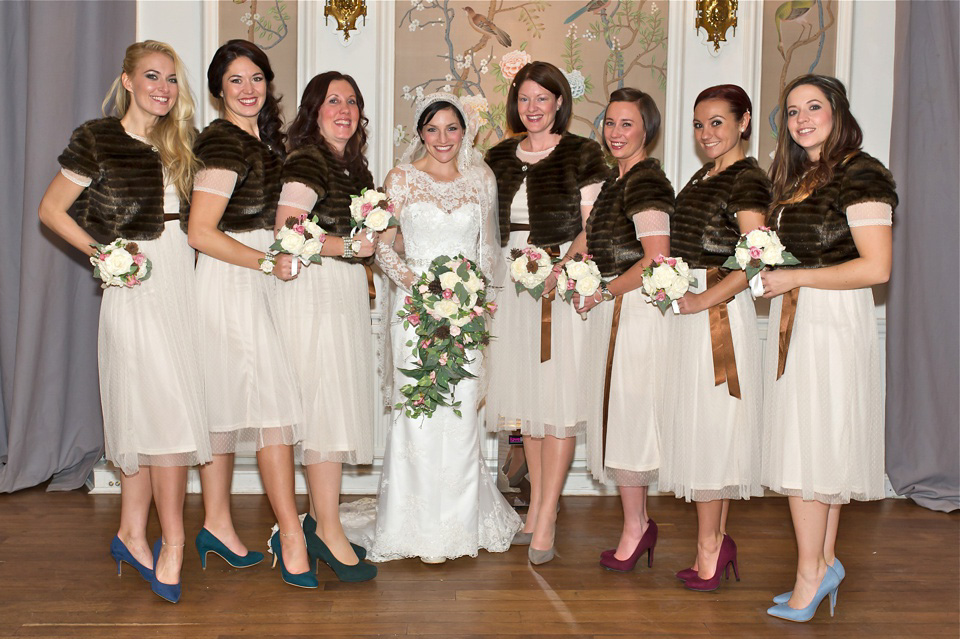 A charming winter wedding at The George in Rye with a bride wearing a Juliet cap veil. Images by The Edge Photography.