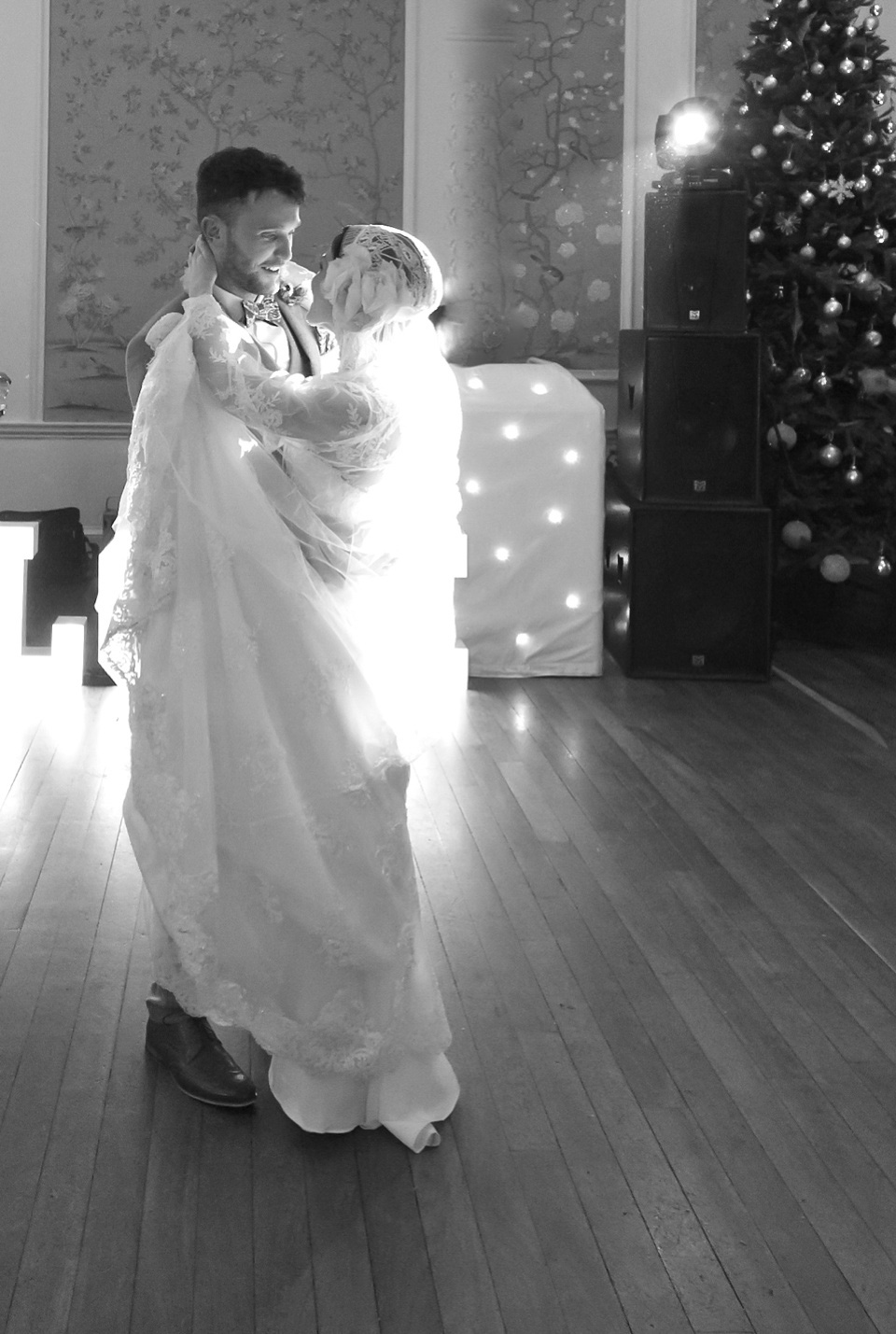 A charming winter wedding at The George in Rye with a bride wearing a Juliet cap veil. Images by The Edge Photography.