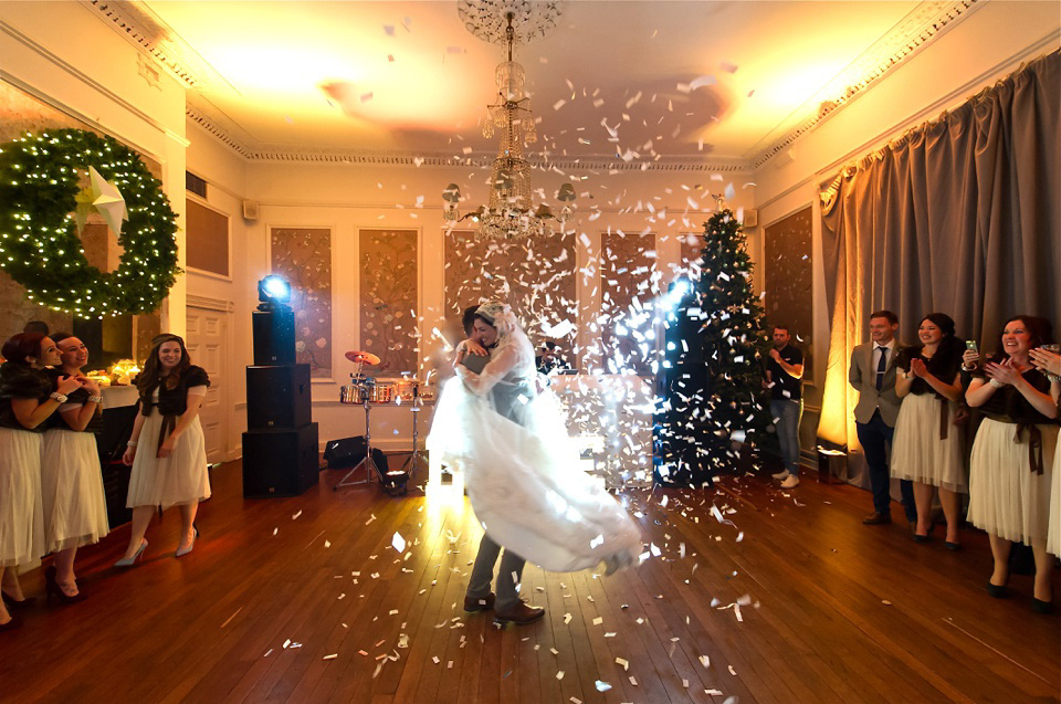 A charming winter wedding at The George in Rye with a bride wearing a Juliet cap veil. Images by The Edge Photography.