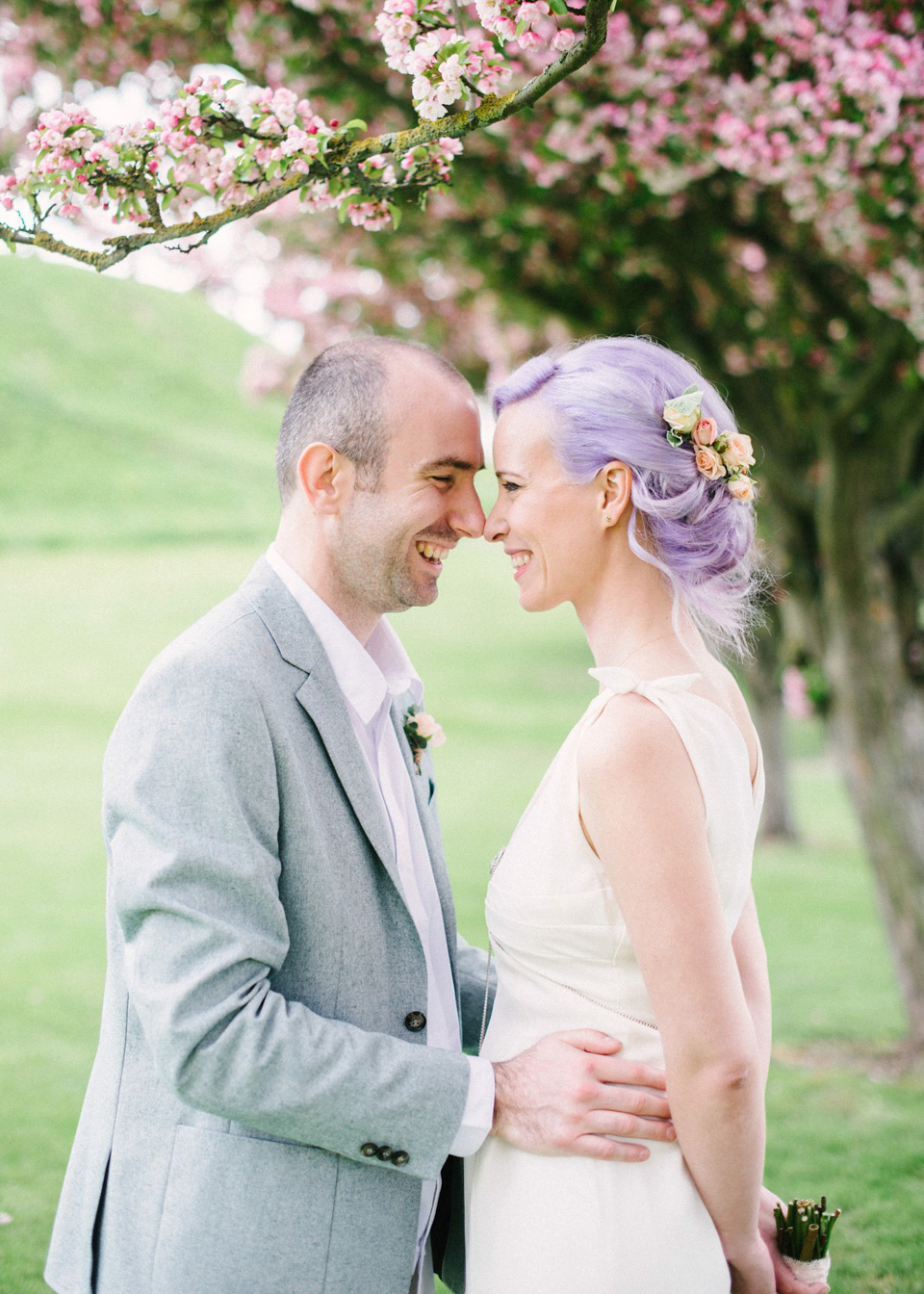 Lilac Hair and Pastel Flowers for an Intimate Springtime Pub Wedding Shot on Film. Photography by Hannah Duffy.