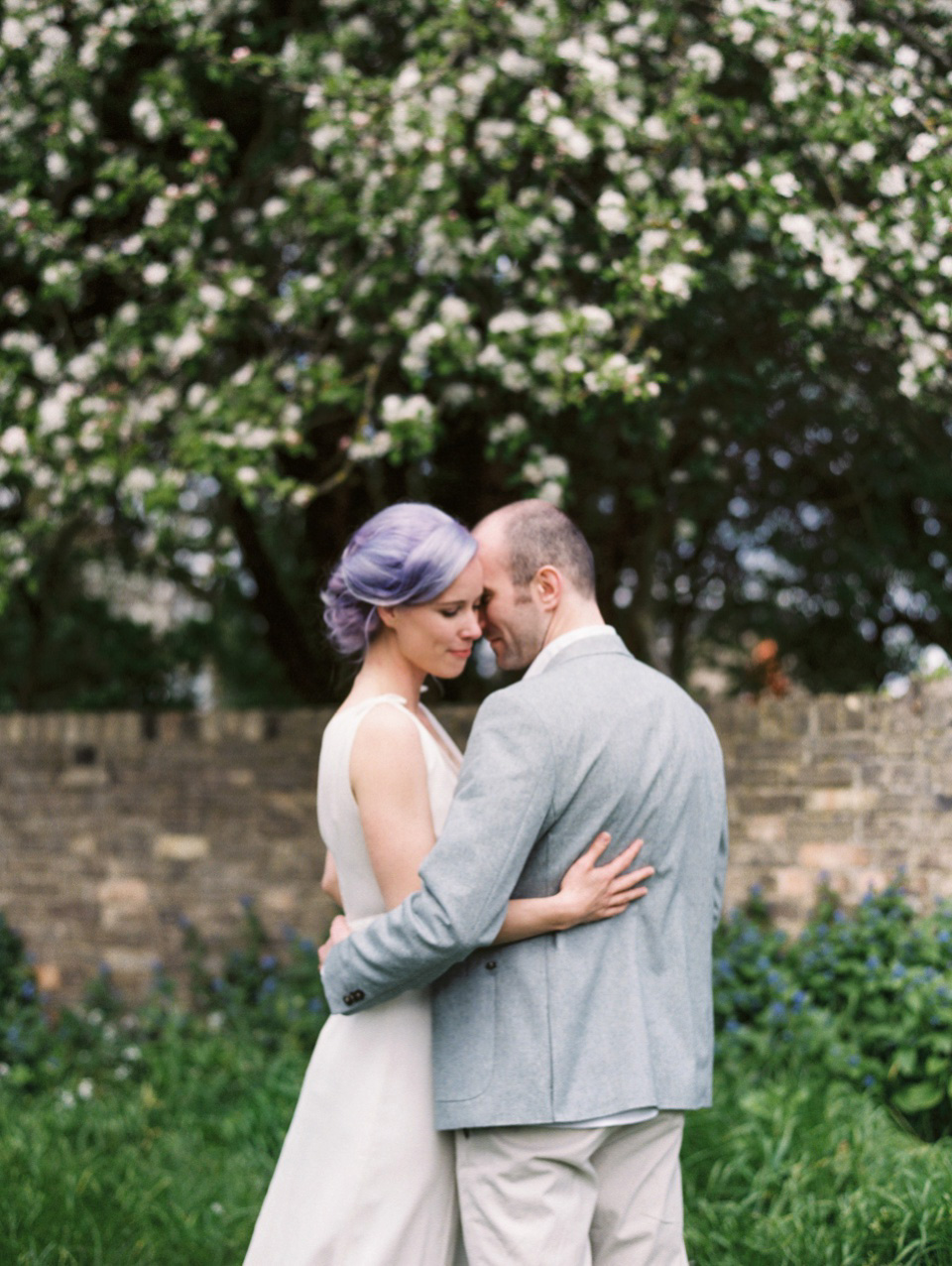 Lilac Hair and Pastel Flowers for an Intimate Springtime Pub Wedding Shot on Film. Photography by Hannah Duffy.