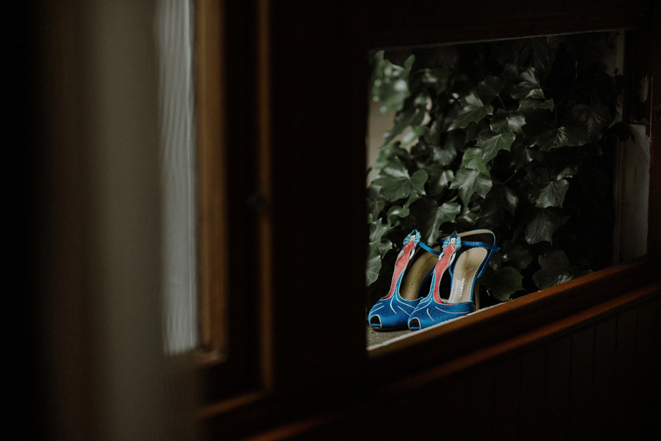 A colourful David Bowie and Wes Anderson inspired wedding in Glasgow. The bride wore a gown from Davids Bridal. Photography by The Kitcheners.