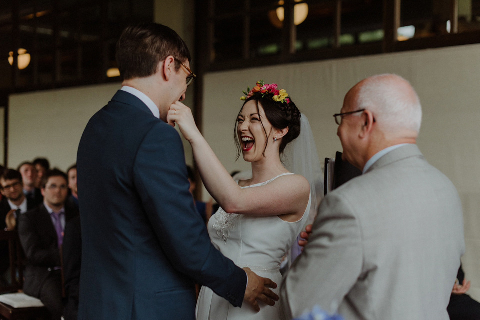 A colourful David Bowie and Wes Anderson inspired wedding in Glasgow. The bride wore a gown from Davids Bridal. Photography by The Kitcheners.