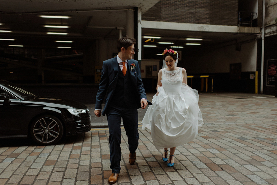 A colourful David Bowie and Wes Anderson inspired wedding in Glasgow. The bride wore a gown from Davids Bridal. Photography by The Kitcheners.