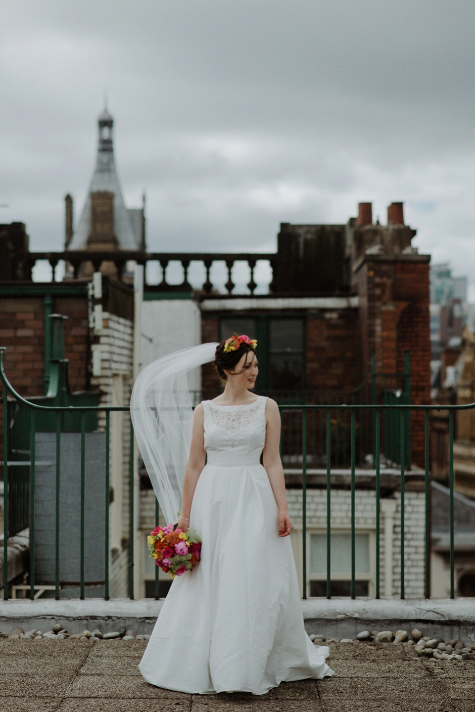 A colourful David Bowie and Wes Anderson inspired wedding in Glasgow. The bride wore a gown from Davids Bridal. Photography by The Kitcheners.