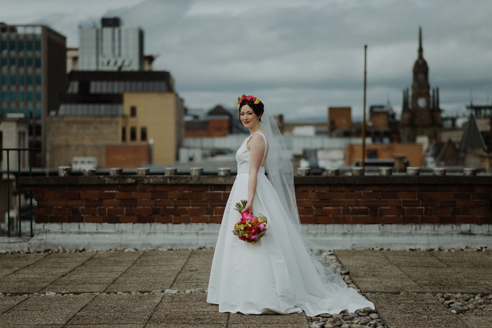 A colourful David Bowie and Wes Anderson inspired wedding in Glasgow. The bride wore a gown from Davids Bridal. Photography by The Kitcheners.