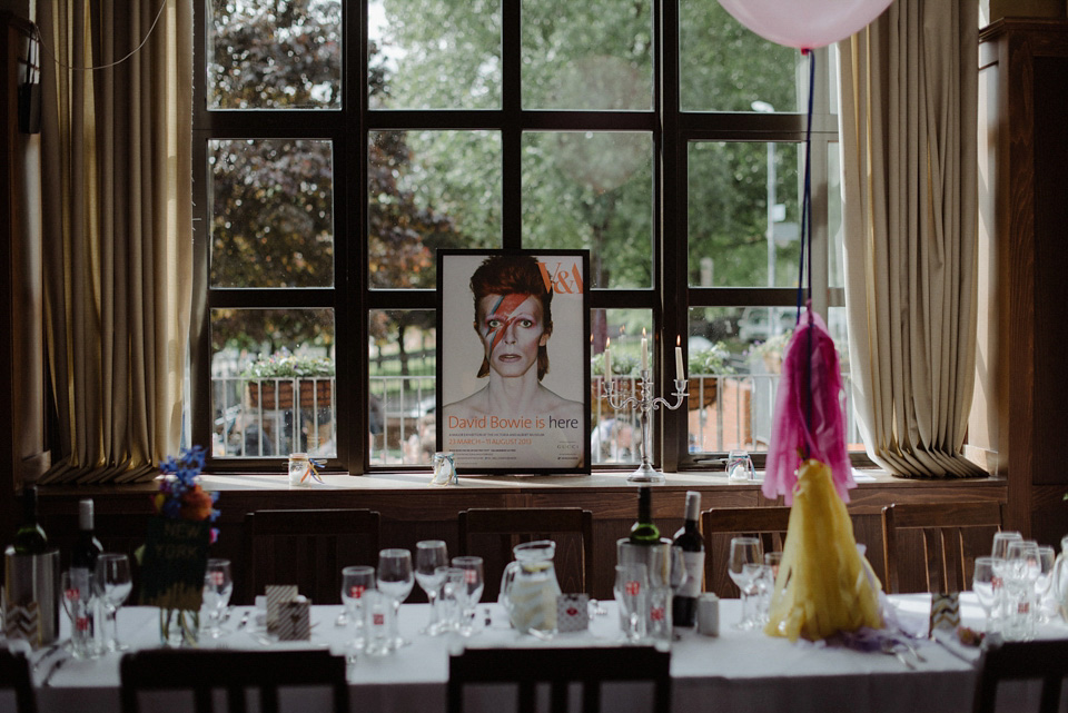 A colourful David Bowie and Wes Anderson inspired wedding in Glasgow. The bride wore a gown from Davids Bridal. Photography by The Kitcheners.