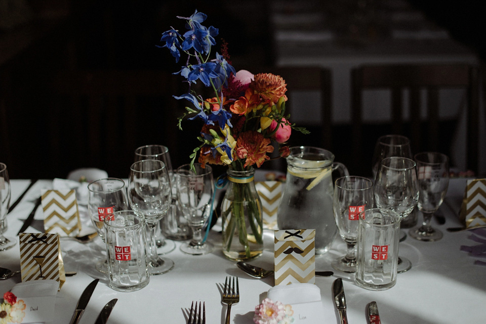 A colourful David Bowie and Wes Anderson inspired wedding in Glasgow. The bride wore a gown from Davids Bridal. Photography by The Kitcheners.