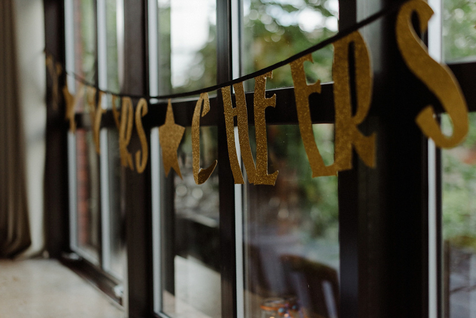 A colourful David Bowie and Wes Anderson inspired wedding in Glasgow. The bride wore a gown from Davids Bridal. Photography by The Kitcheners.