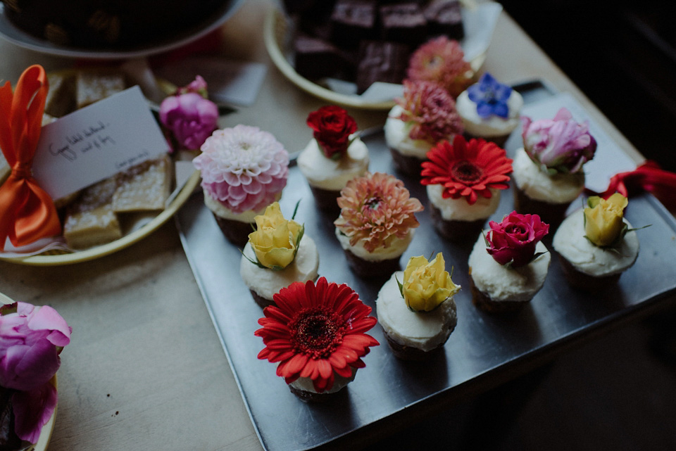 A colourful David Bowie and Wes Anderson inspired wedding in Glasgow. The bride wore a gown from Davids Bridal. Photography by The Kitcheners.