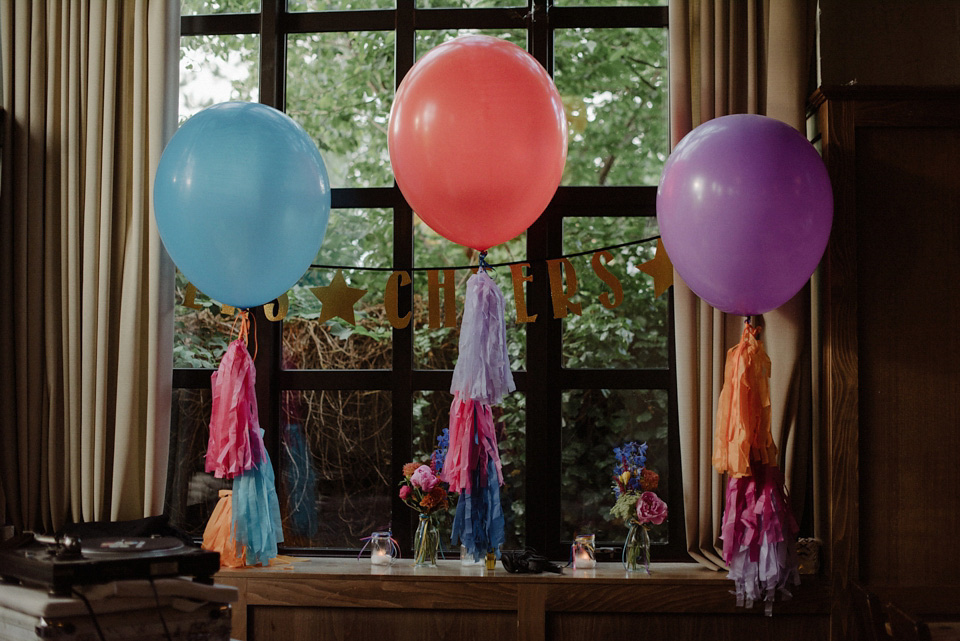 A colourful David Bowie and Wes Anderson inspired wedding in Glasgow. The bride wore a gown from Davids Bridal. Photography by The Kitcheners.