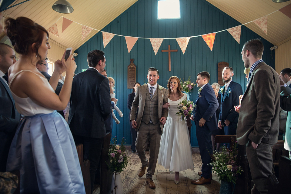 Ange and Ben's wedding was inspired by the 1940s and took place just two weeks after Ange lost her father. A beautiful celebration of love, life and family. Photography by Assassynation.