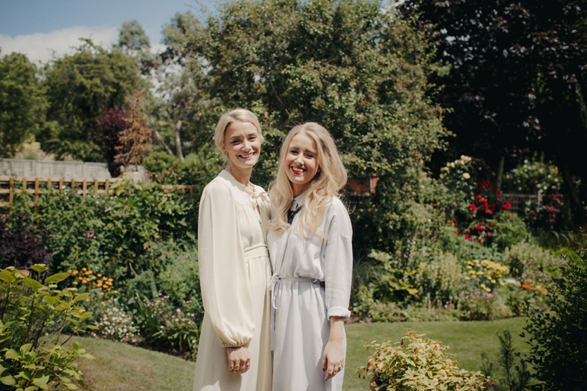 Bride Jess wears an original 1970's vintage Ossie Clarke dress for her Jewish wedding ceremony at Home House in London. Photography by Rebecca Goddard.