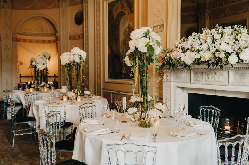 Bride Jess wears an original 1970's vintage Ossie Clarke dress for her Jewish wedding ceremony at Home House in London. Photography by Rebecca Goddard.