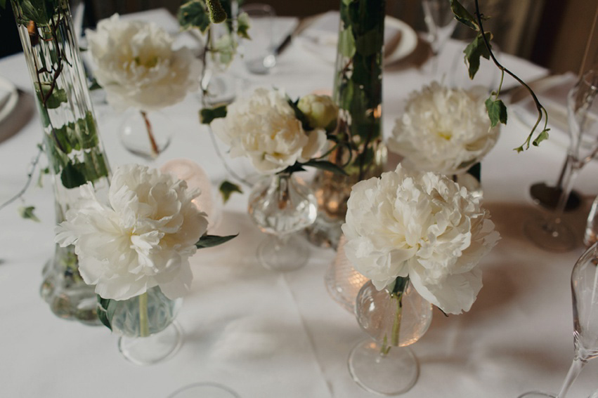 Bride Jess wears an original 1970's vintage Ossie Clarke dress for her Jewish wedding ceremony at Home House in London. Photography by Rebecca Goddard.