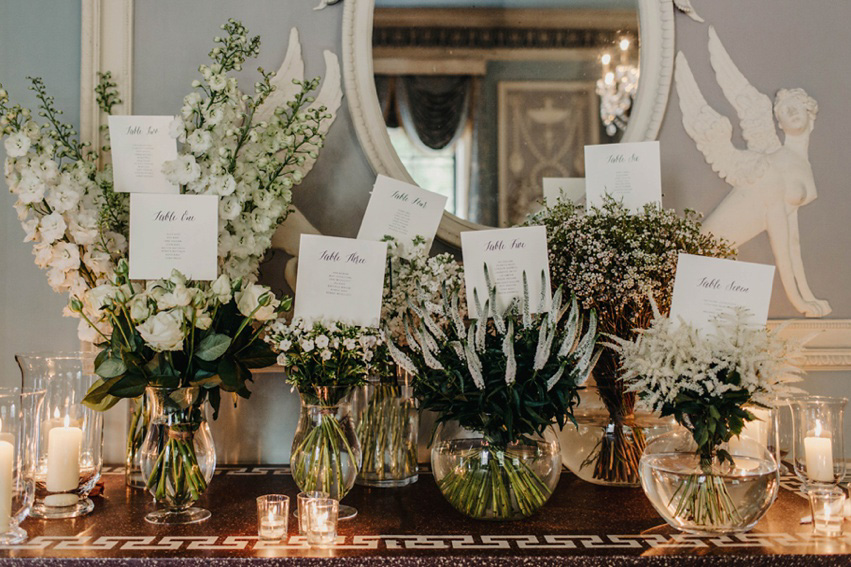 Bride Jess wears an original 1970's vintage Ossie Clarke dress for her Jewish wedding ceremony at Home House in London. Photography by Rebecca Goddard.