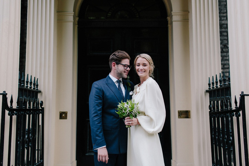 Bride Jess wears an original 1970's vintage Ossie Clarke dress for her Jewish wedding ceremony at Home House in London. Photography by Rebecca Goddard.