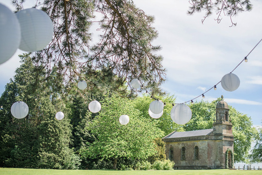 A Theia Couture wedding dress and ostrich feathers for this elegant Babington House wedding. Photography by Ria Mishaal.